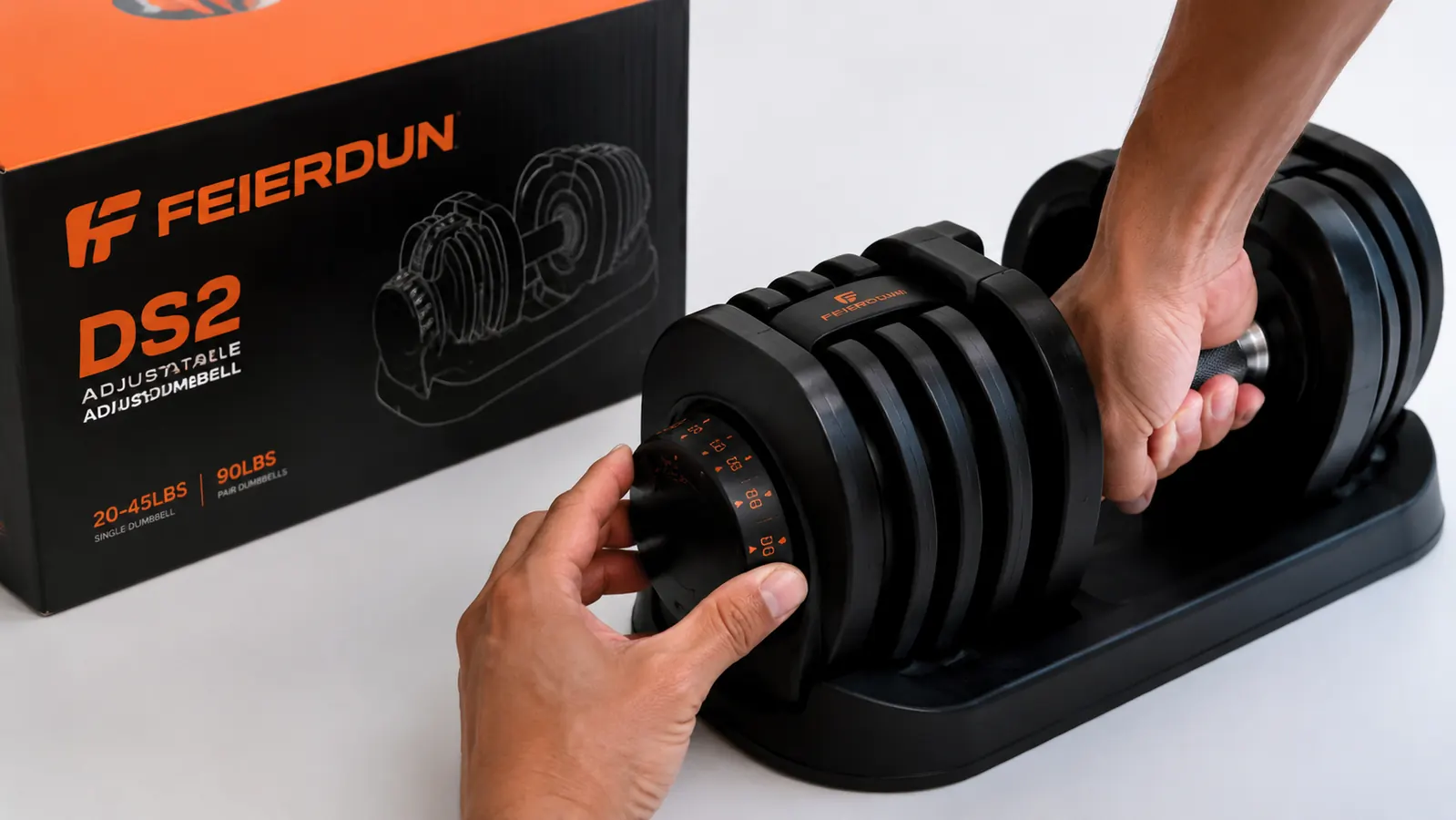 Close-up of a hand turning the weight selector dial on the FEIERDUN DS2 adjustable dumbbell from 20 to 45 pounds